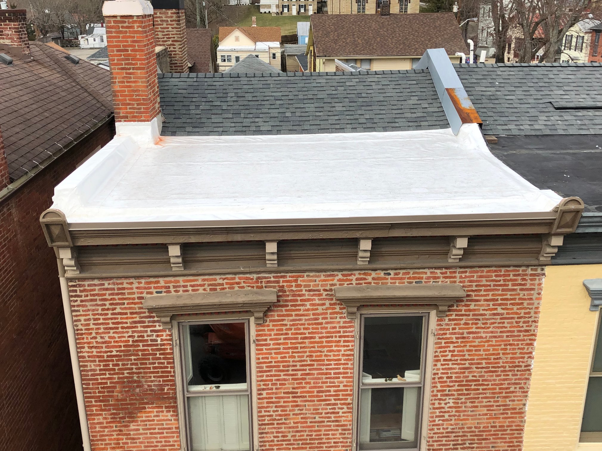 Downtown Madison, IN Flat Roof and Gutter Installation